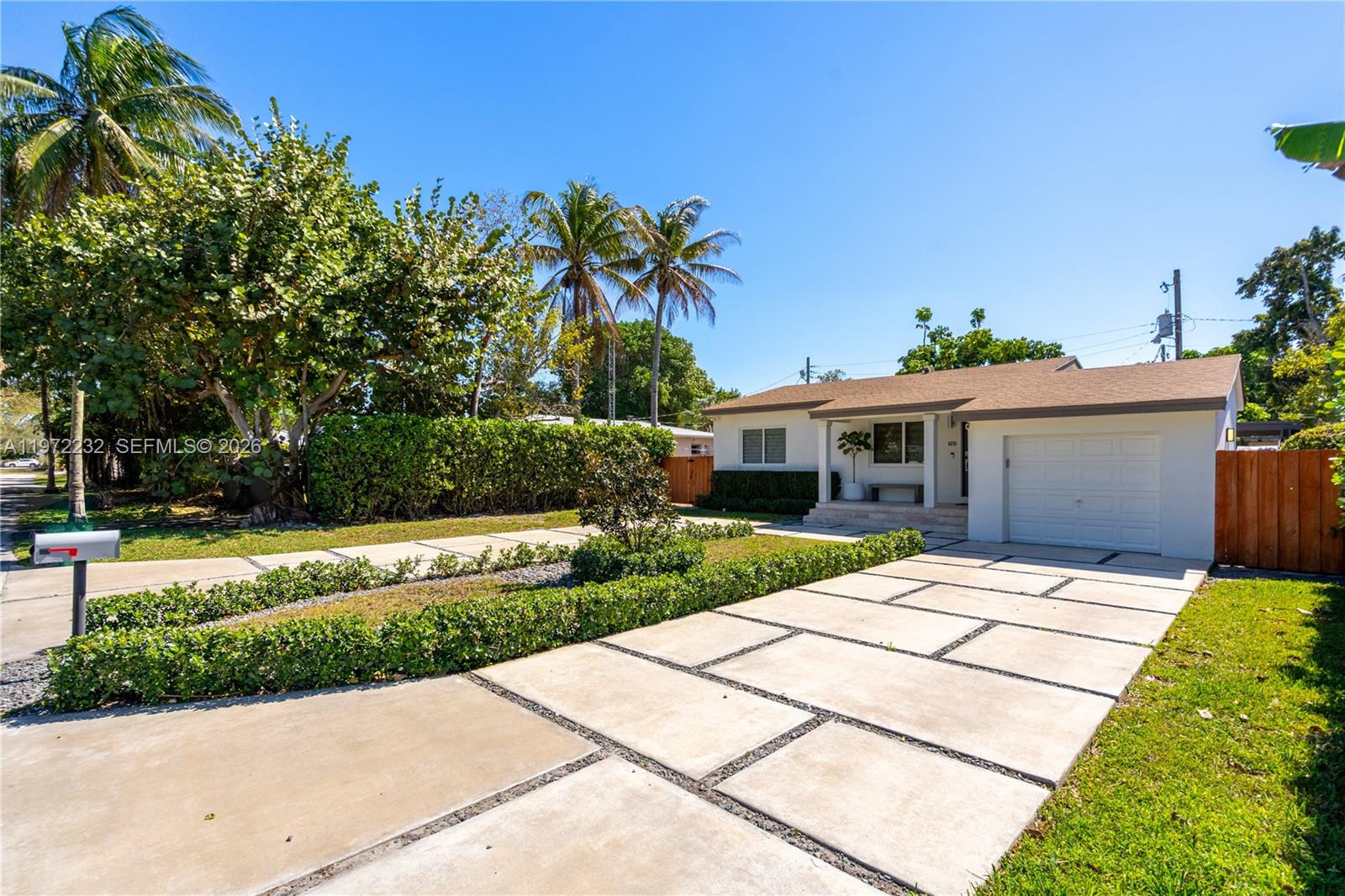 6376 Southwest 20th Street Miami, FL 33155 - Photo 5 of 42 a front view of house with yard