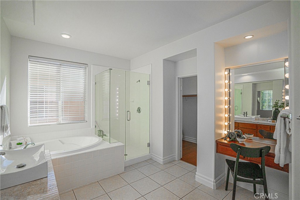 17 Mt Vernon Irvine, CA 92620 - Photo 16 of 25 a spacious bathroom with a tub sink and mirror
