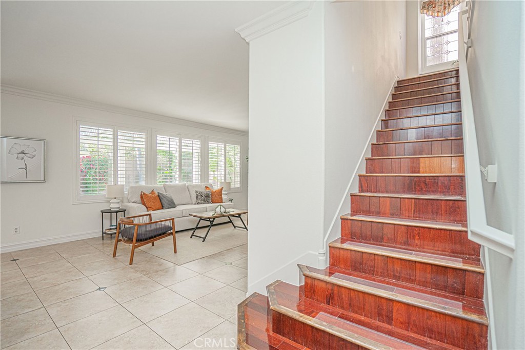 17 Mt Vernon Irvine, CA 92620 - Photo 8 of 25 a living room with furniture and stairs