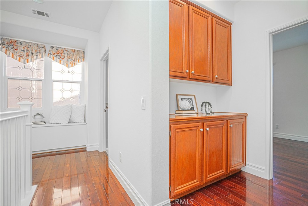 17 Mt Vernon Irvine, CA 92620 - Photo 10 of 25 a bathroom with a sink a mirror and next to a window