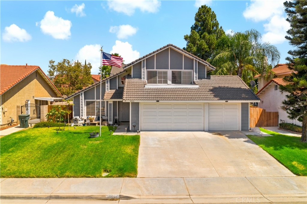 9052 Mandarin Lane Riverside, CA 92508 - Photo 1 of 1 a house view with a garden space