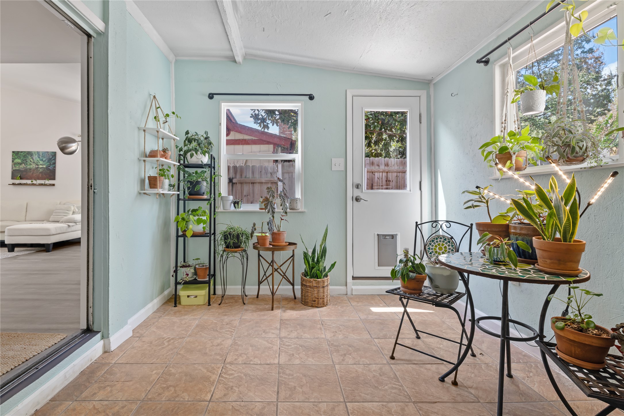 8906 Trone Circle, Unit A Austin, TX 78758 - Photo 11 of 30 the sun room, a unique feature of just this unit