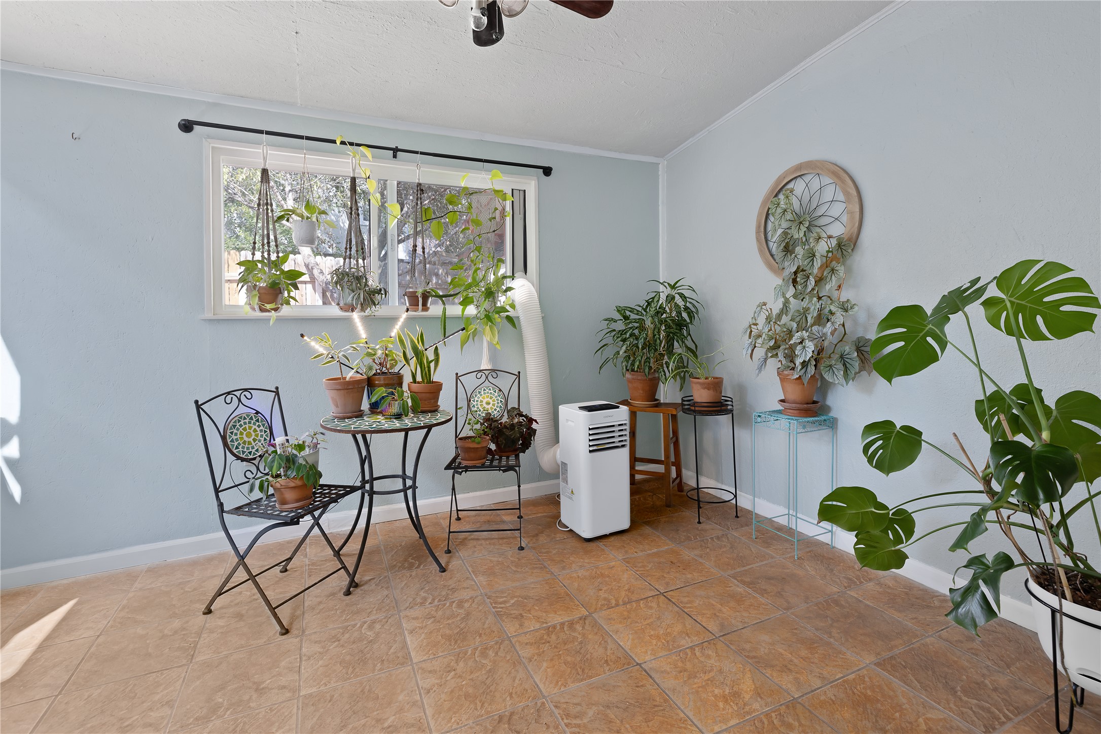 8906 Trone Circle, Unit A Austin, TX 78758 - Photo 12 of 30 a lovely space to read and relax with your plant babies