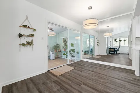 a view of a livingroom and a wooden floor