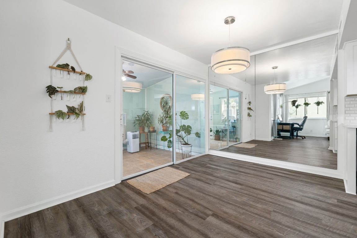 8906 Trone Circle, Unit A Austin, TX 78758 - Photo 14 of 33 a view of a livingroom and a wooden floor