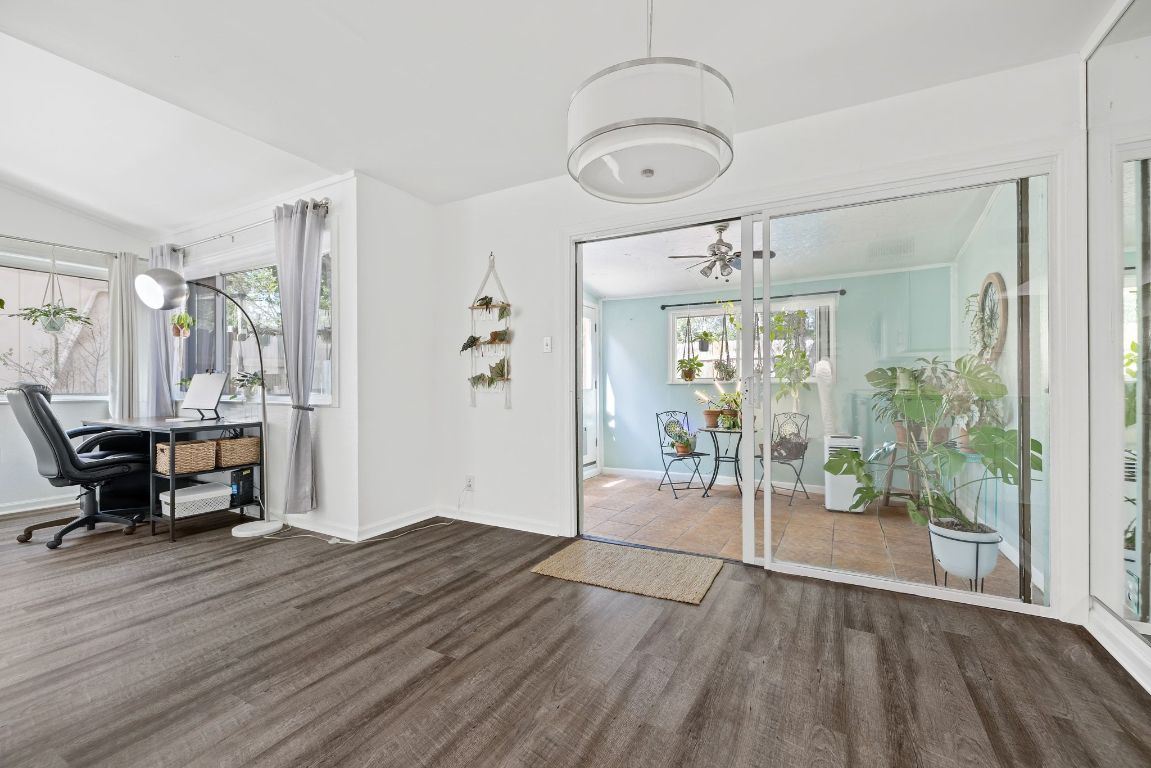 8906 Trone Circle, Unit A Austin, TX 78758 - Photo 15 of 33 a view of empty room with wooden floor