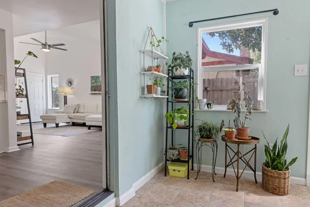 a view of a hallway and dining room