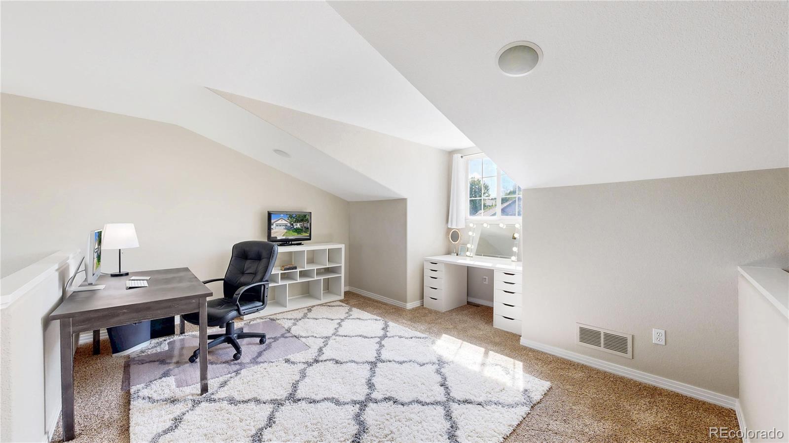 3401 West 111th Loop, Unit B Westminster, CO 80031 - Photo 16 of 40 a workspace with furniture and window
