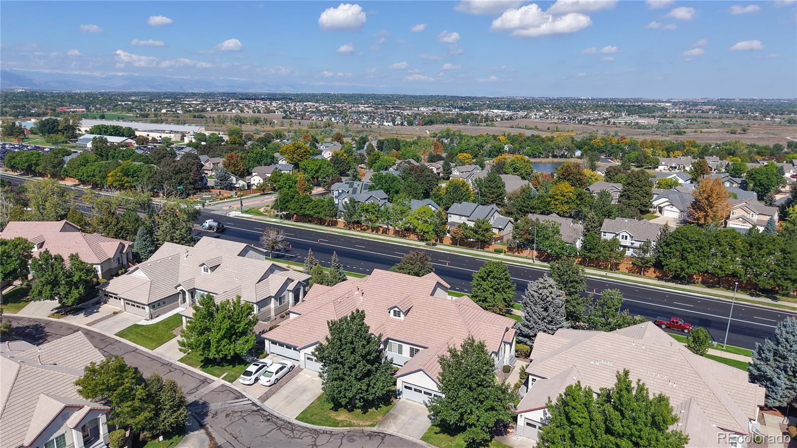 3401 West 111th Loop, Unit B Westminster, CO 80031 - Photo 34 of 40 an aerial view of a house with a garden