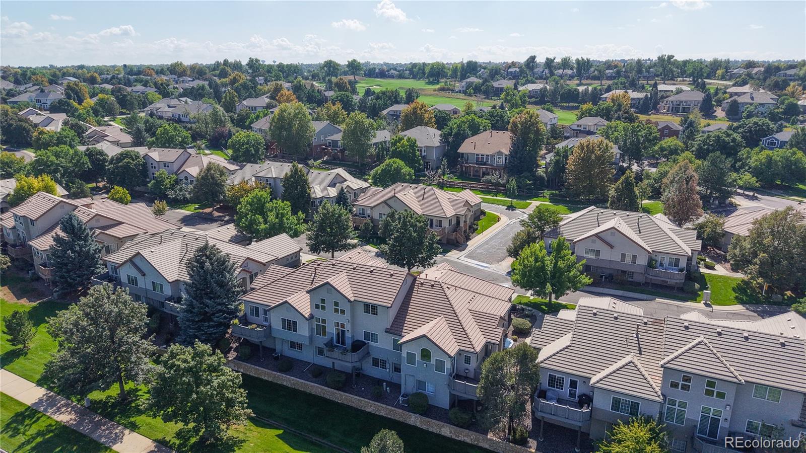 3401 West 111th Loop, Unit B Westminster, CO 80031 - Photo 35 of 40 an aerial view of residential houses with outdoor space