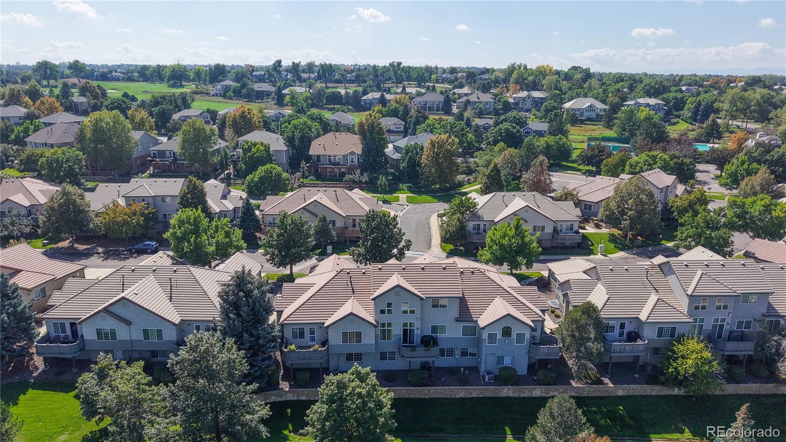 3401 West 111th Loop, Unit B Westminster, CO 80031 - Photo 36 of 40 an aerial view of house with yard and ocean view