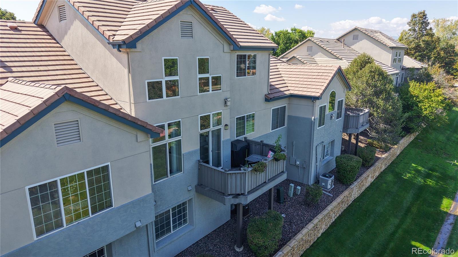 3401 West 111th Loop, Unit B Westminster, CO 80031 - Photo 38 of 40 a view of front of house with a yard