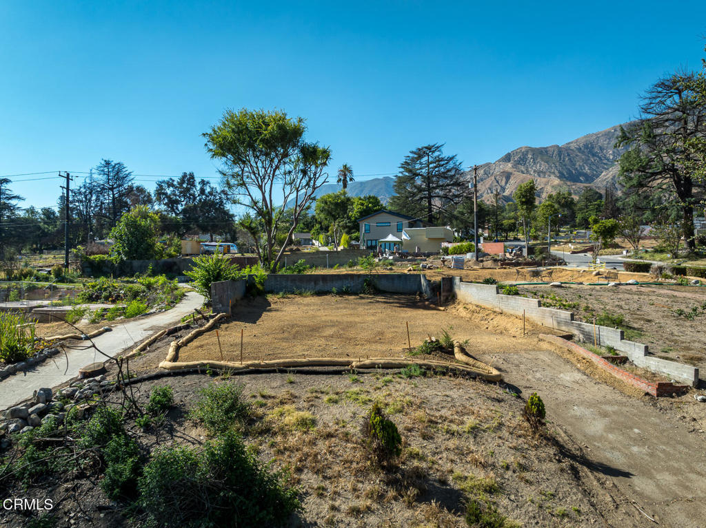 1077 East Palm Street Altadena, CA 91001 - Photo 18 of 44 a view of a yard with a fountain