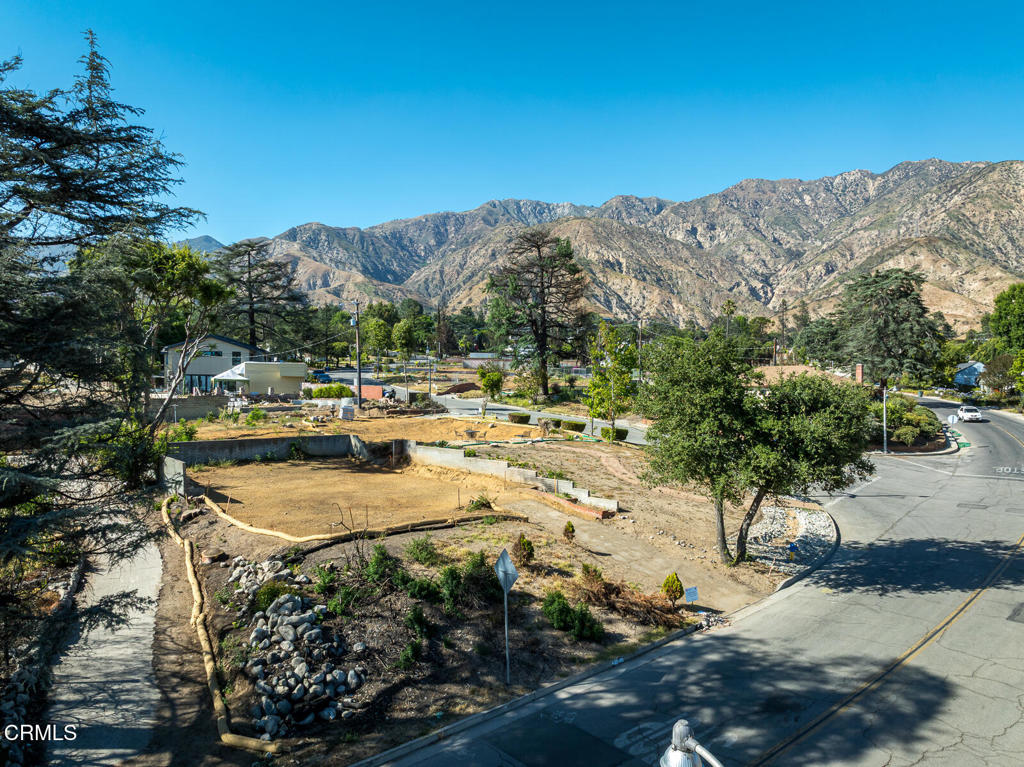 1077 East Palm Street Altadena, CA 91001 - Photo 20 of 44 a view of a lake with a mountain and trees
