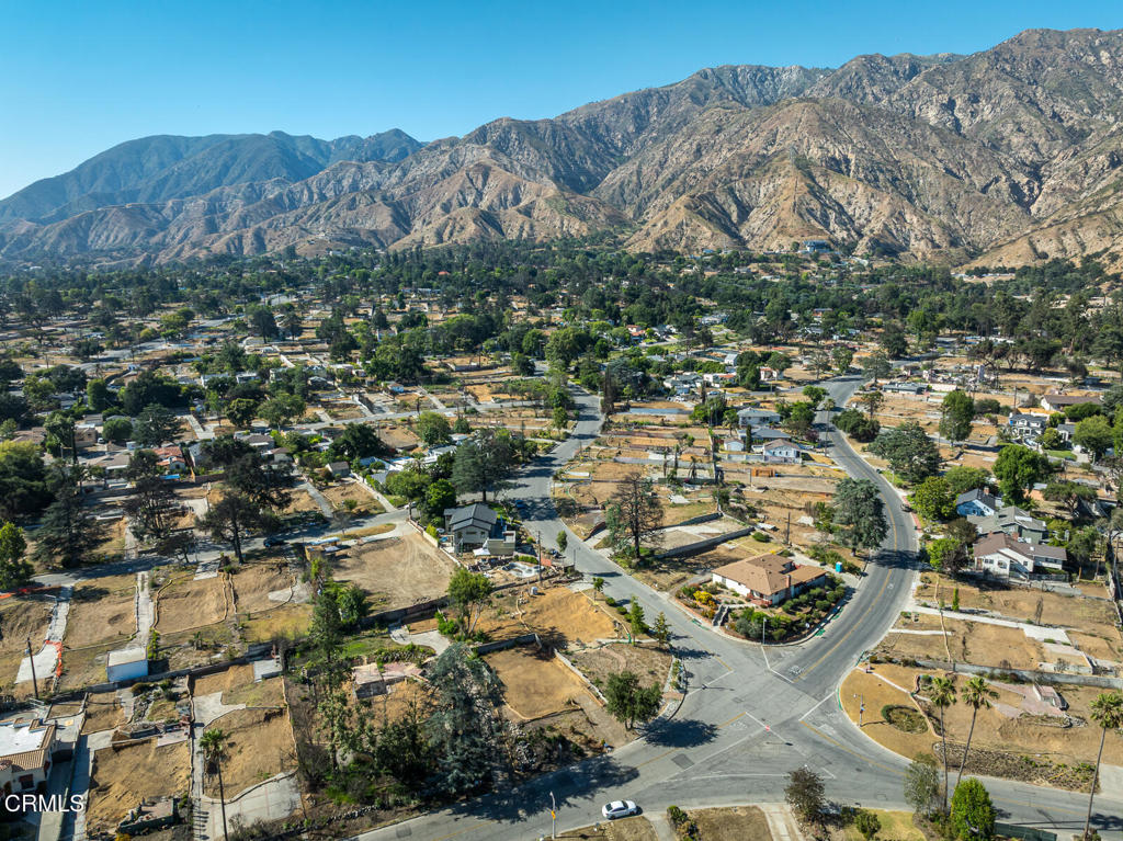 1077 East Palm Street Altadena, CA 91001 - Photo 29 of 44 an aerial view of residential house with parking and trees