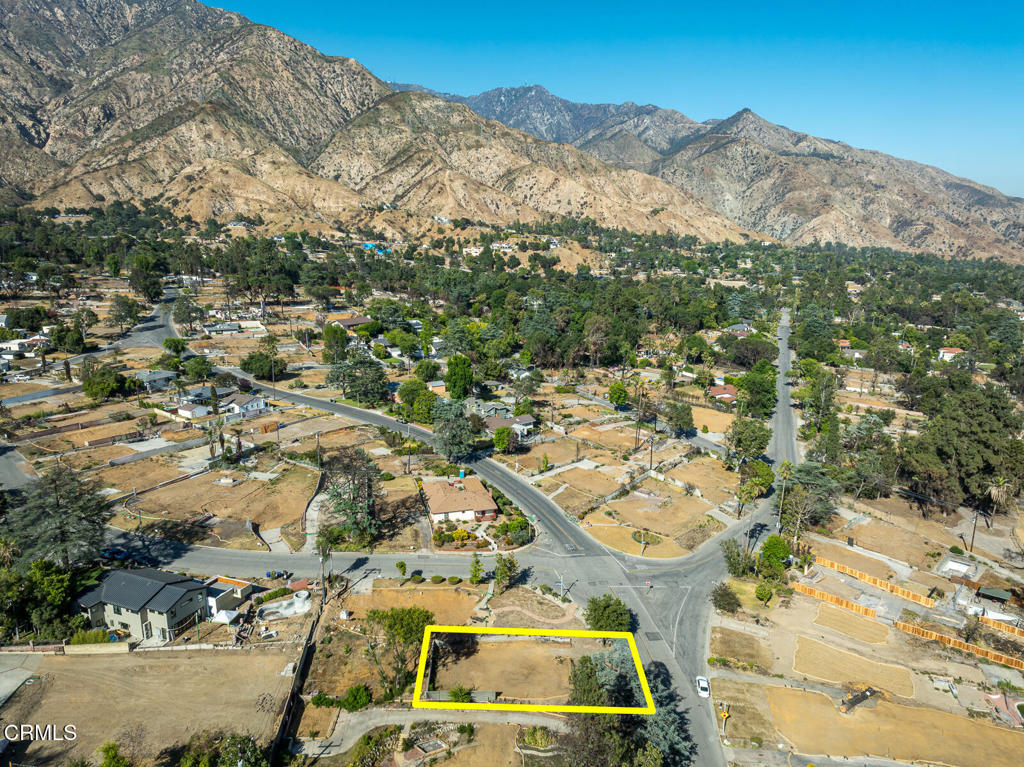 1077 East Palm Street Altadena, CA 91001 - Photo 30 of 44 an aerial view of a house with a mountain