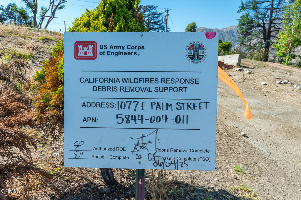 1077 East Palm Street Altadena, CA 91001 - Photo 3 of 44 a sign on the side of a building