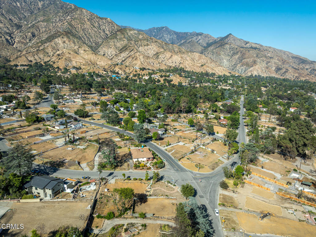 1077 East Palm Street Altadena, CA 91001 - Photo 31 of 44 an aerial view of residential houses with outdoor space