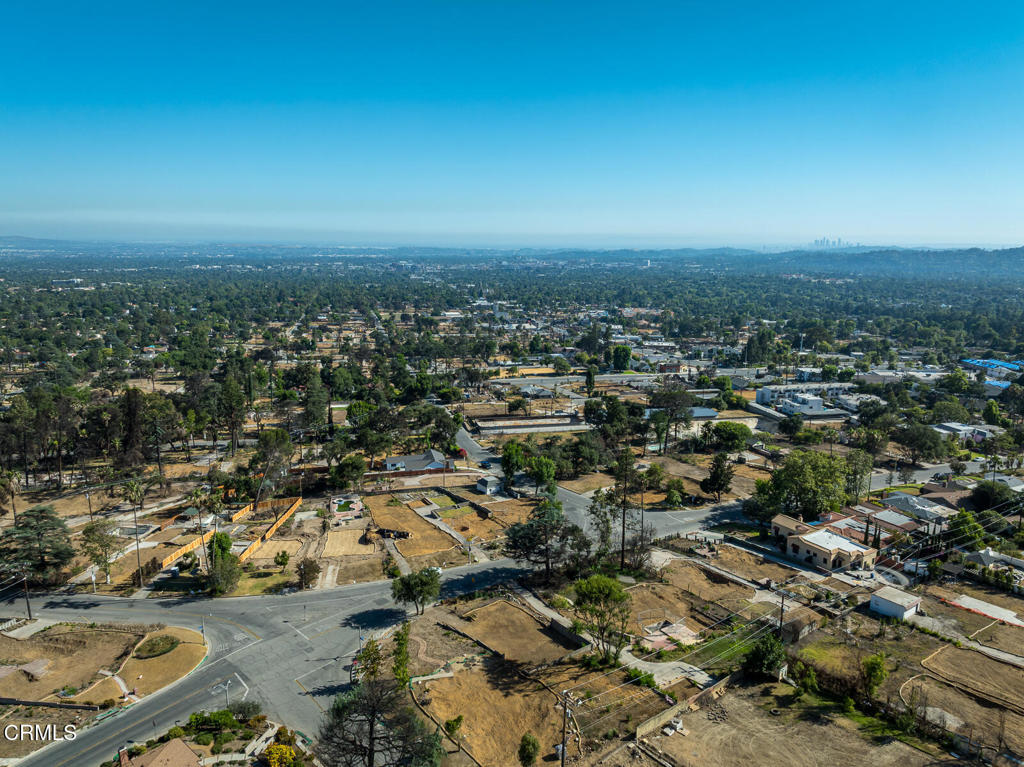 1077 East Palm Street Altadena, CA 91001 - Photo 40 of 44 an aerial view of residential building and trees around