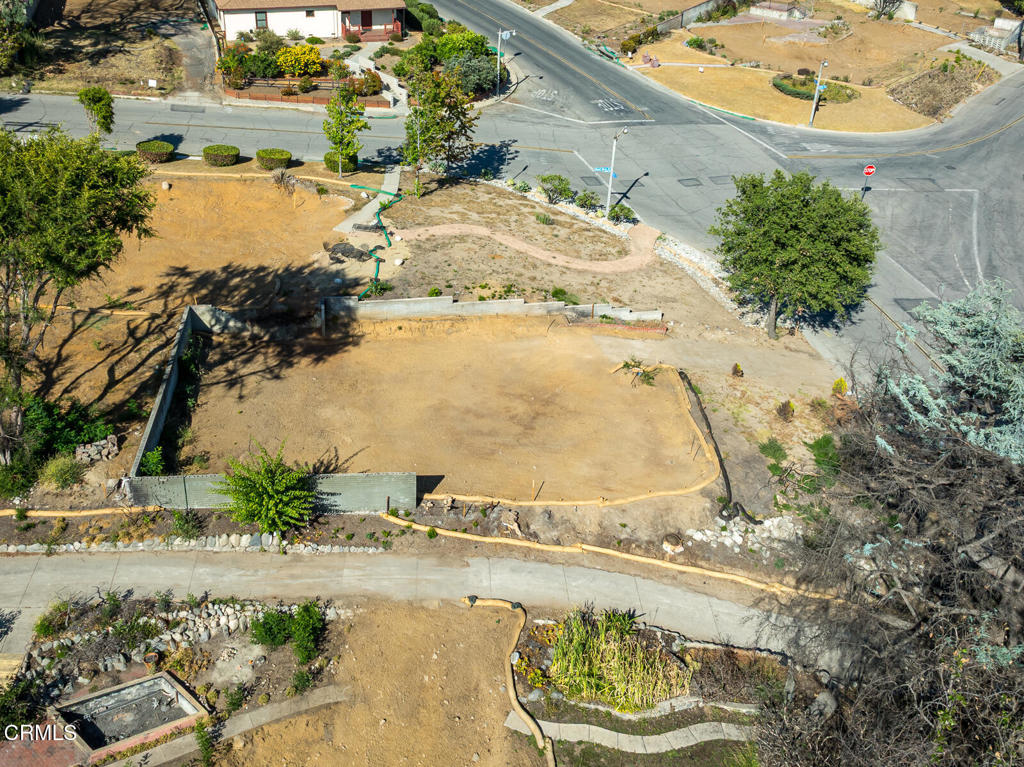 1077 East Palm Street Altadena, CA 91001 - Photo 43 of 44 an aerial view of a house with a yard and lake view