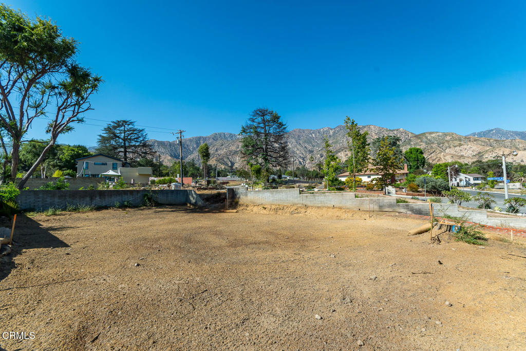 1077 East Palm Street Altadena, CA 91001 - Photo 7 of 44 a view of a lake with houses