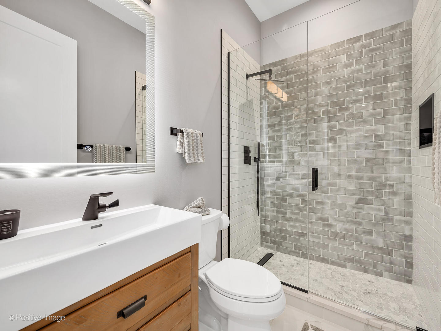 11480 Circle Drive Burr Ridge, IL 60527 - Photo 17 of 53 a bathroom with a sink a toilet and shower