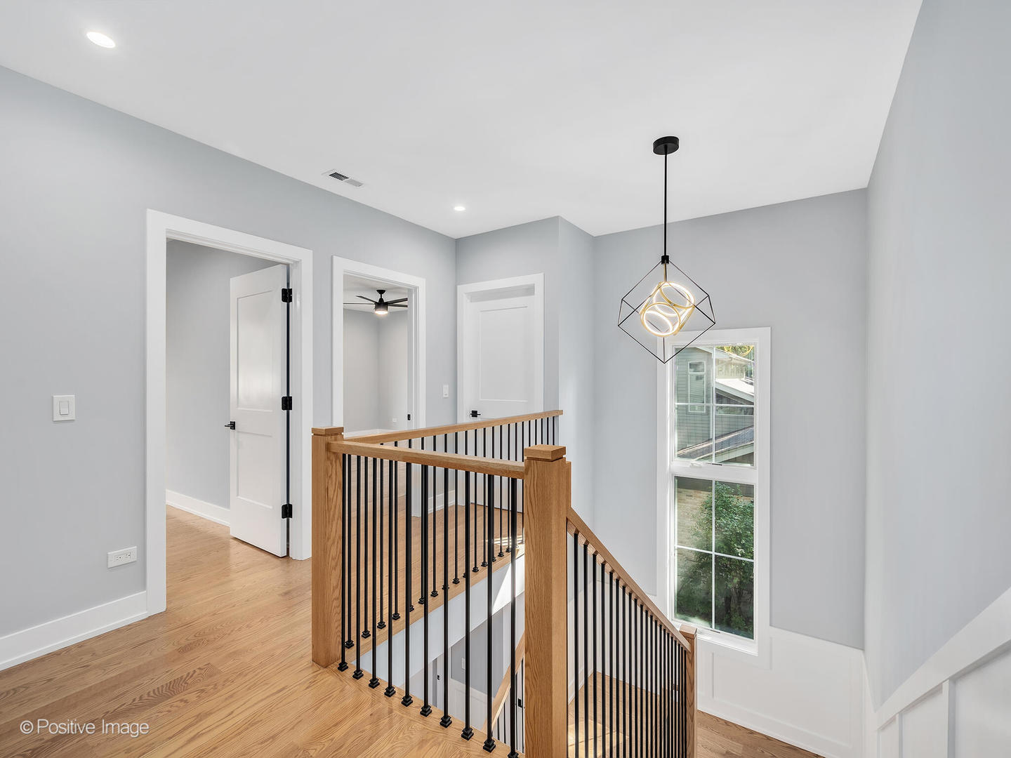 11480 Circle Drive Burr Ridge, IL 60527 - Photo 20 of 53 a view of a hallway with windows and chandelier