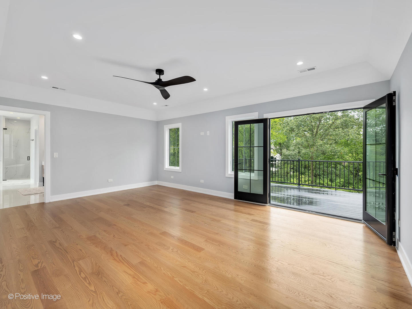 11480 Circle Drive Burr Ridge, IL 60527 - Photo 22 of 53 a view of empty room with a ceiling fan and windows