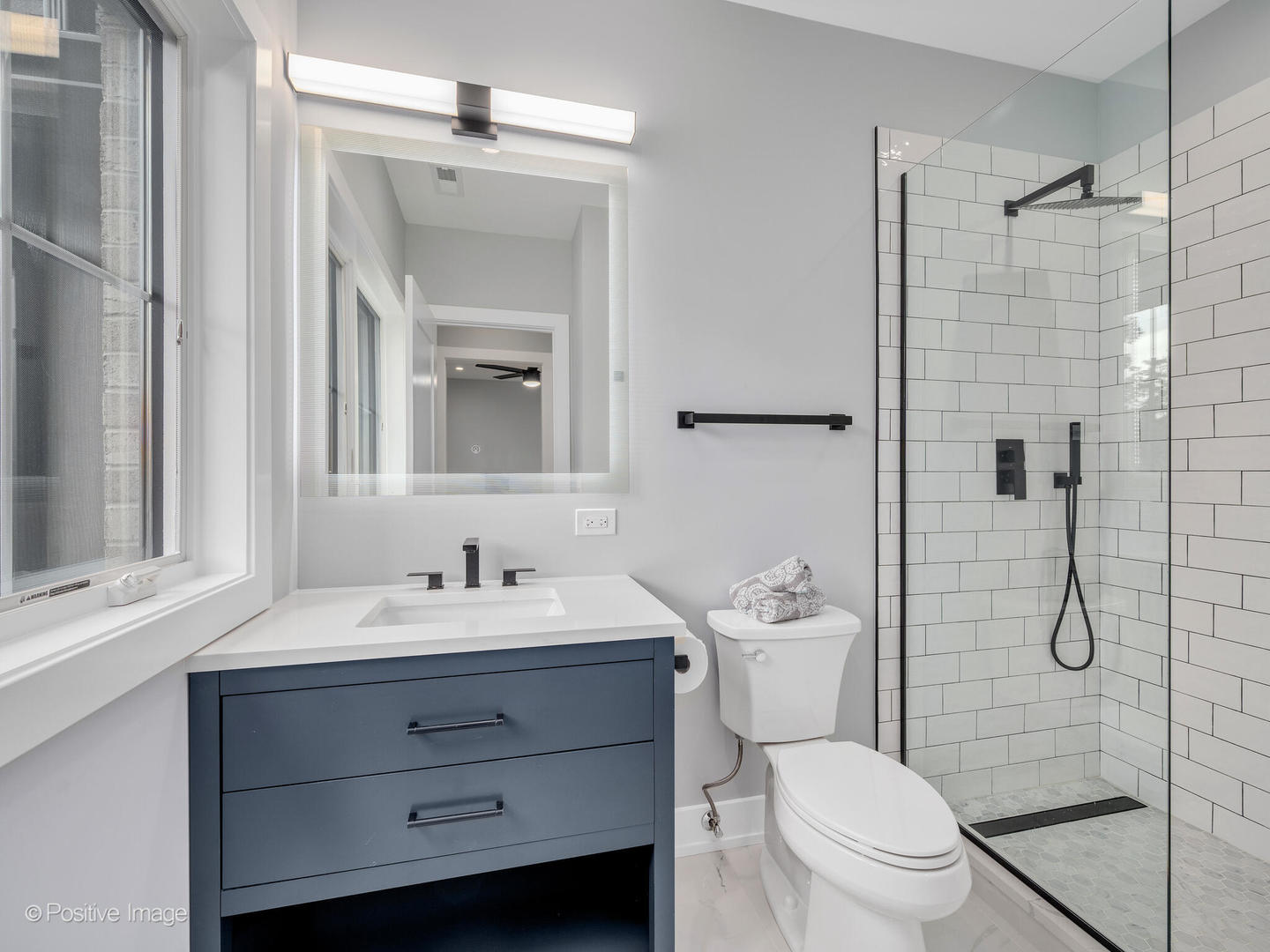 11480 Circle Drive Burr Ridge, IL 60527 - Photo 28 of 53 a bathroom with a sink toilet vanity and shower
