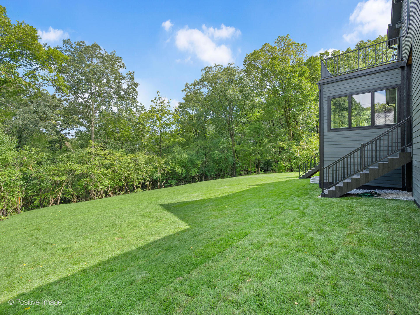 11480 Circle Drive Burr Ridge, IL 60527 - Photo 47 of 53 a view of a backyard with large trees