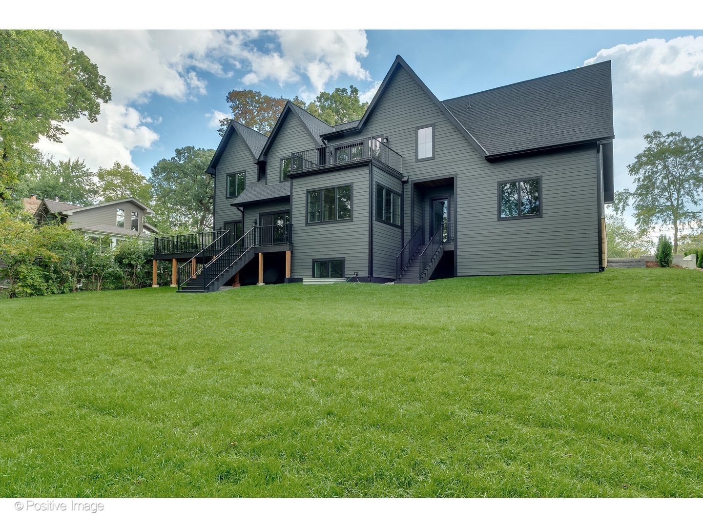 11480 Circle Drive Burr Ridge, IL 60527 - Photo 53 of 53 a view of a big house with a big yard and large trees