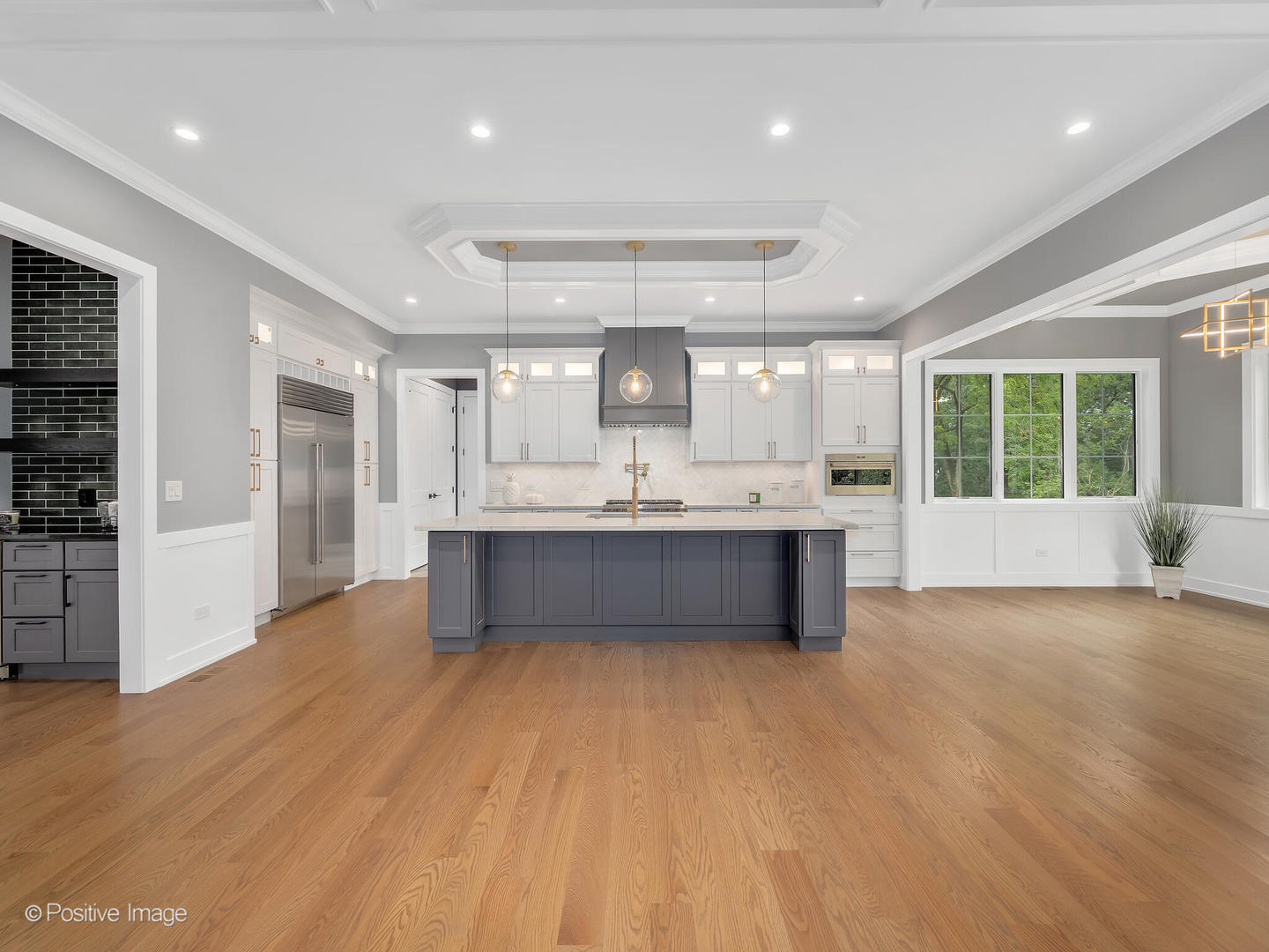 11480 Circle Drive Burr Ridge, IL 60527 - Photo 9 of 53 a large white kitchen with a large window