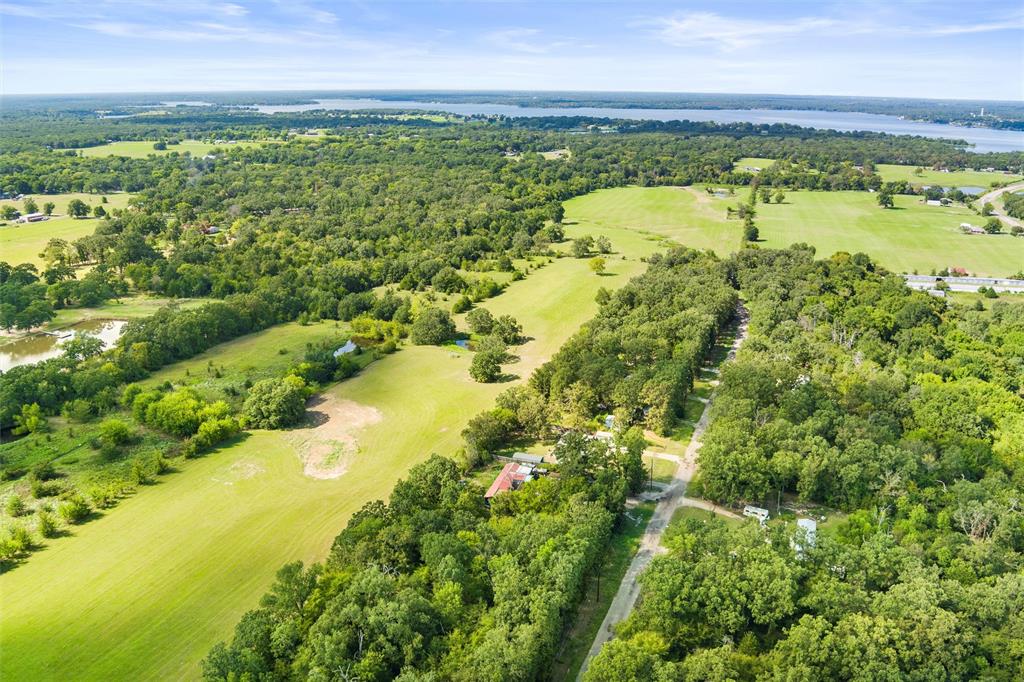 3333 County Road 3333 Emory, TX 75440 - Photo 17 of 22 a view of a lake with a houses