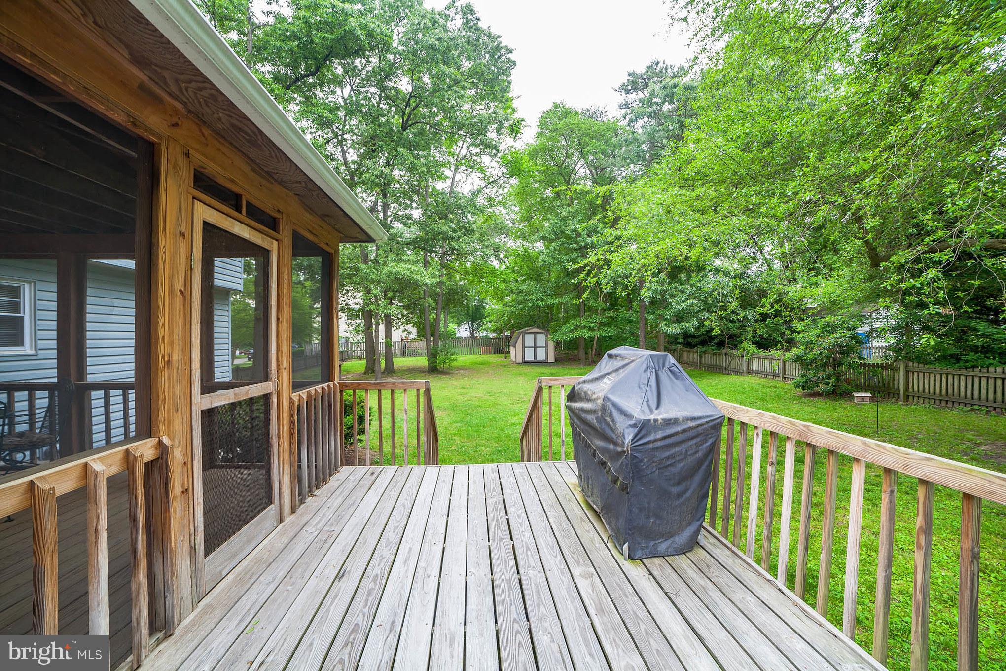 705 Mesquite Road Severn, MD 21144 - Photo 23 of 30 rear deck and screened back porch