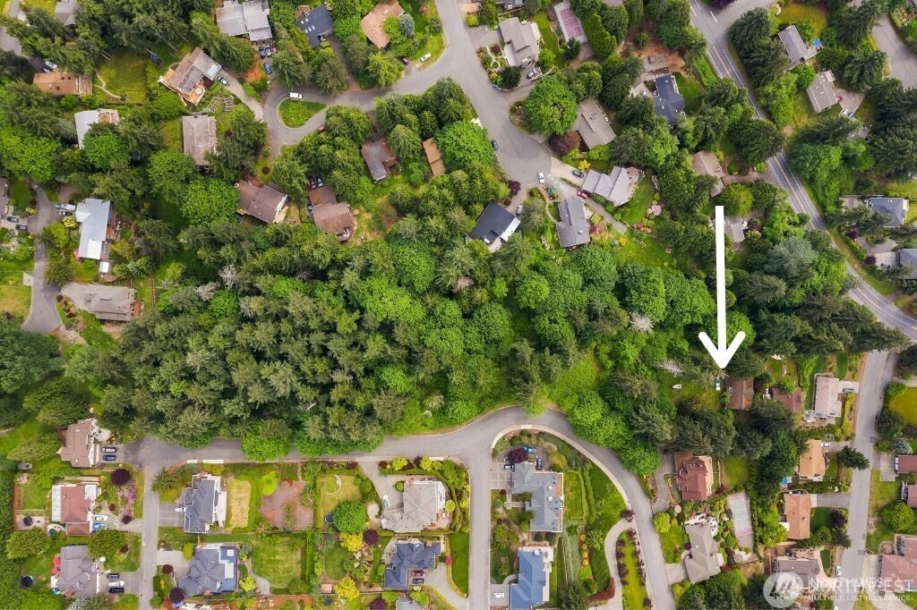 332 Louis Thompson Road Northeast Sammamish, WA 98074 - Photo 3 of 8 a view of building with yard