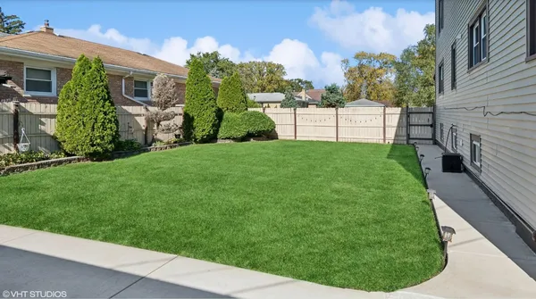 a view of a backyard with garden
