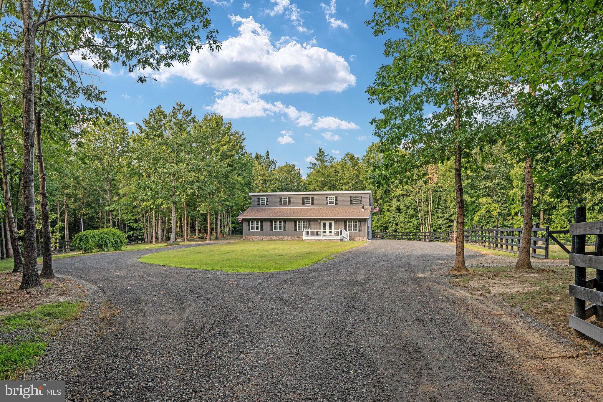 0 Flat Iron Road Montross, VA 22520 - Photo 5 of 116 Charming home nestled among lush trees.