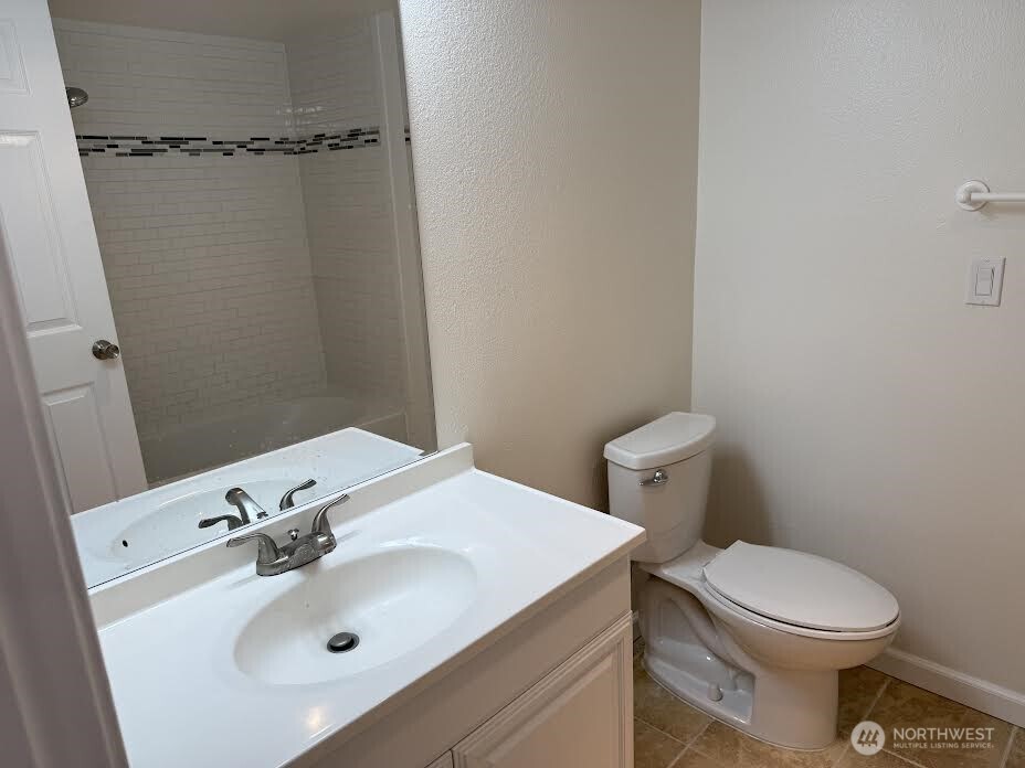 2411 South 248th Street, Unit D24 Kent, WA 98032 - Photo 13 of 21 a bathroom with a sink toilet and mirror