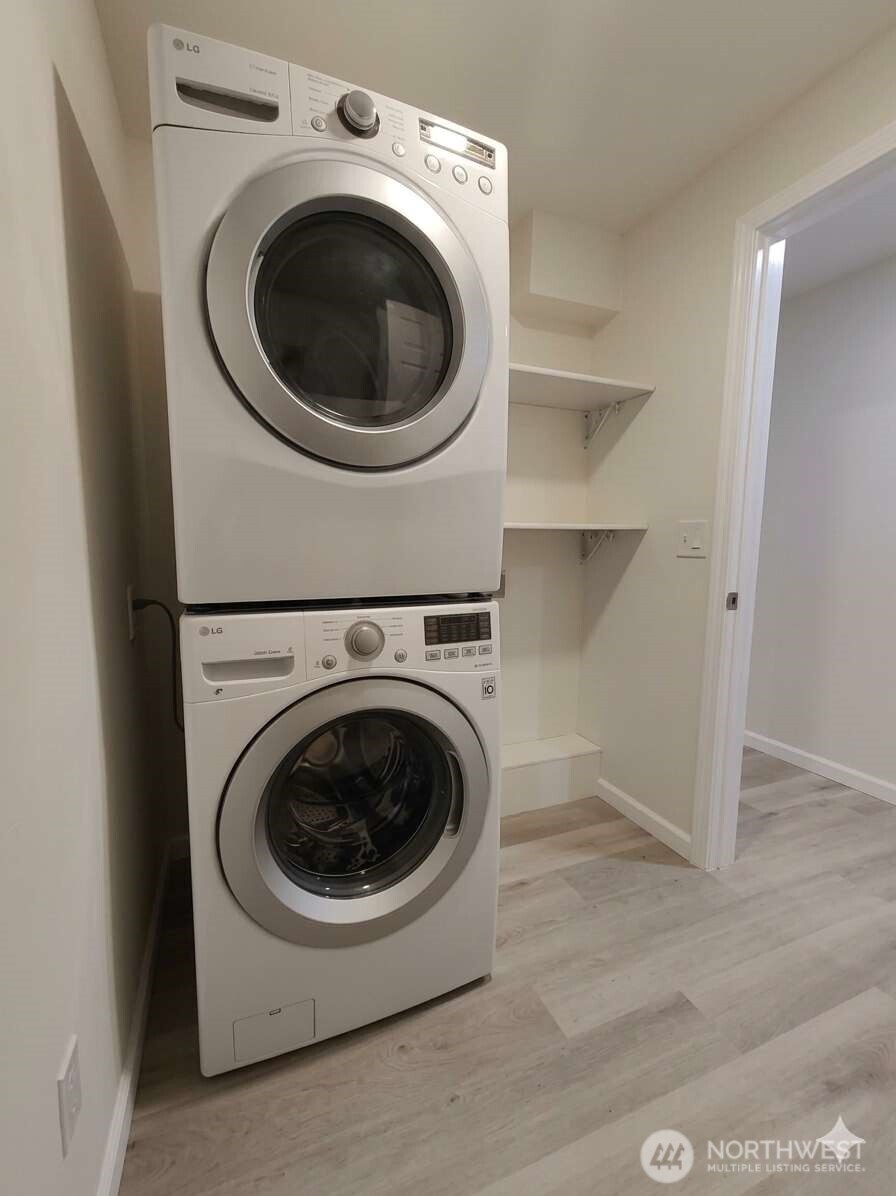 2411 South 248th Street, Unit D24 Kent, WA 98032 - Photo 18 of 21 a utility room with dryer and washer