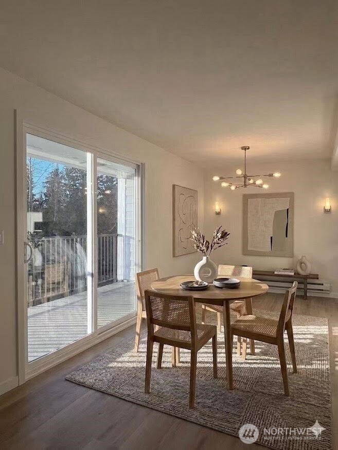 2411 South 248th Street, Unit D24 Kent, WA 98032 - Photo 8 of 21 a view of a dining room with furniture