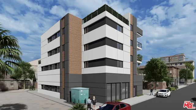 a view of a tall building with a street