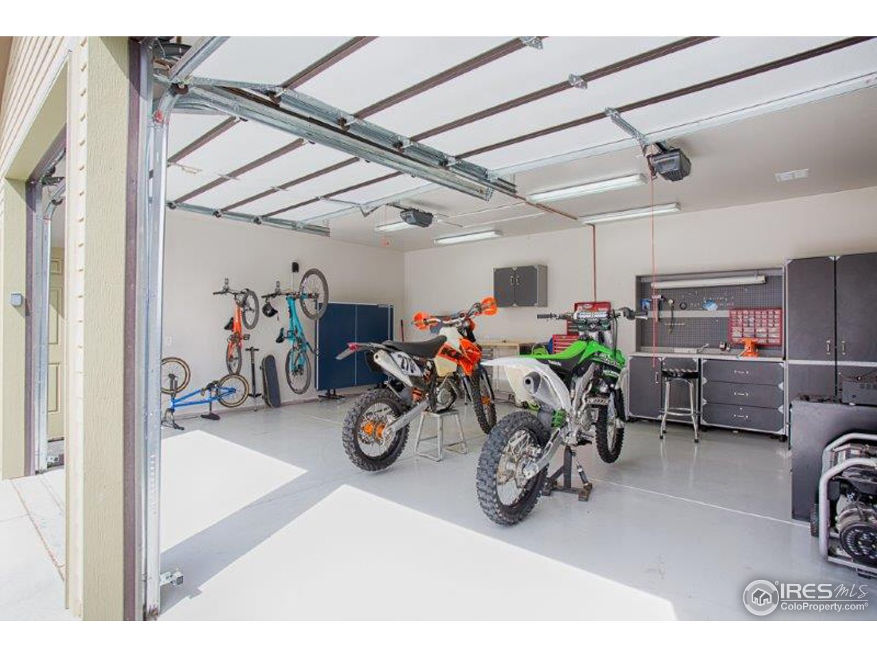 1301 Riverside Avenue Boulder, CO 80304 - Photo 23 of 25 a view of a garage with a bike and a car