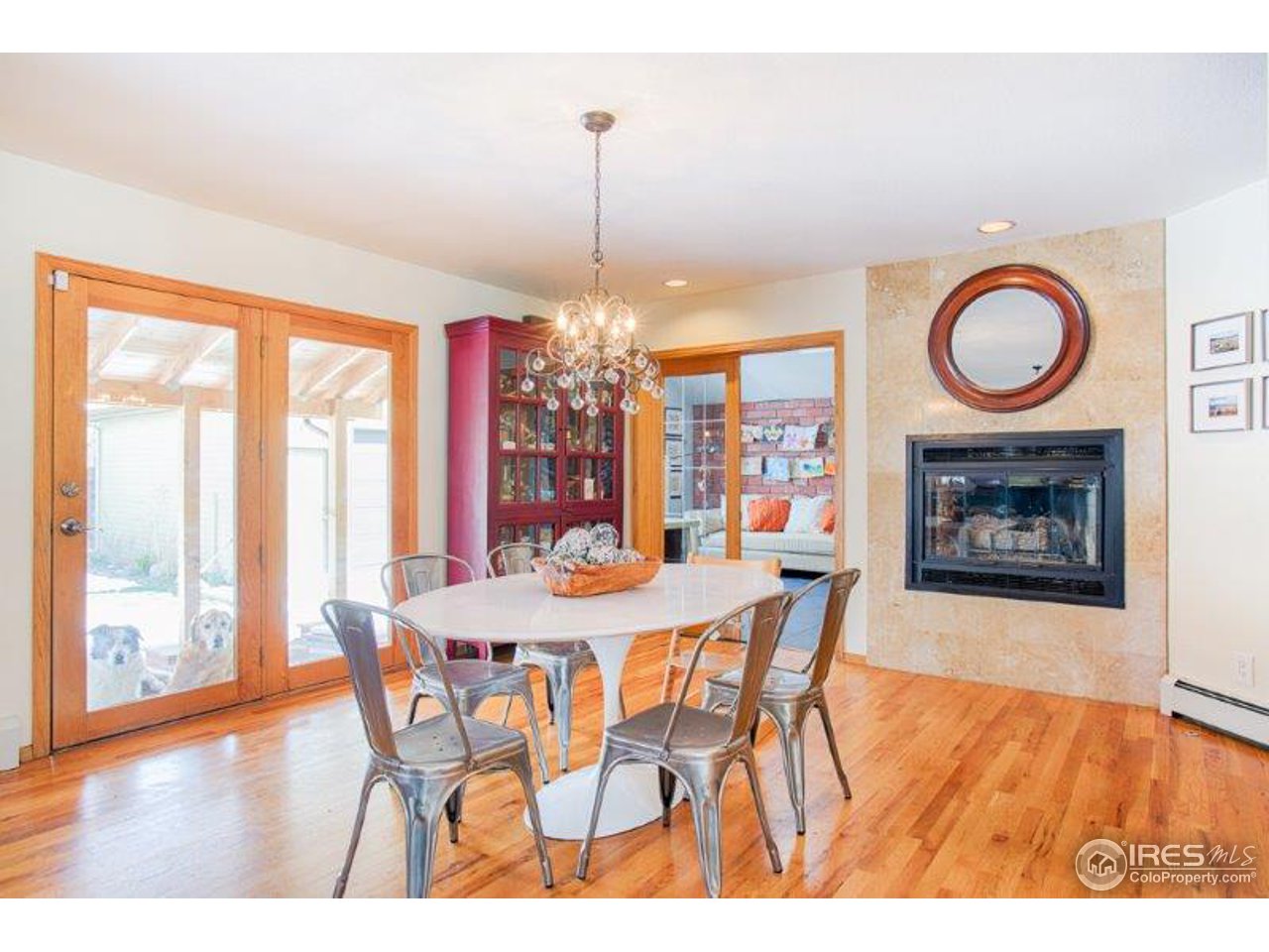 1301 Riverside Avenue Boulder, CO 80304 - Photo 6 of 25 a view of a dining room with furniture window and wooden floor