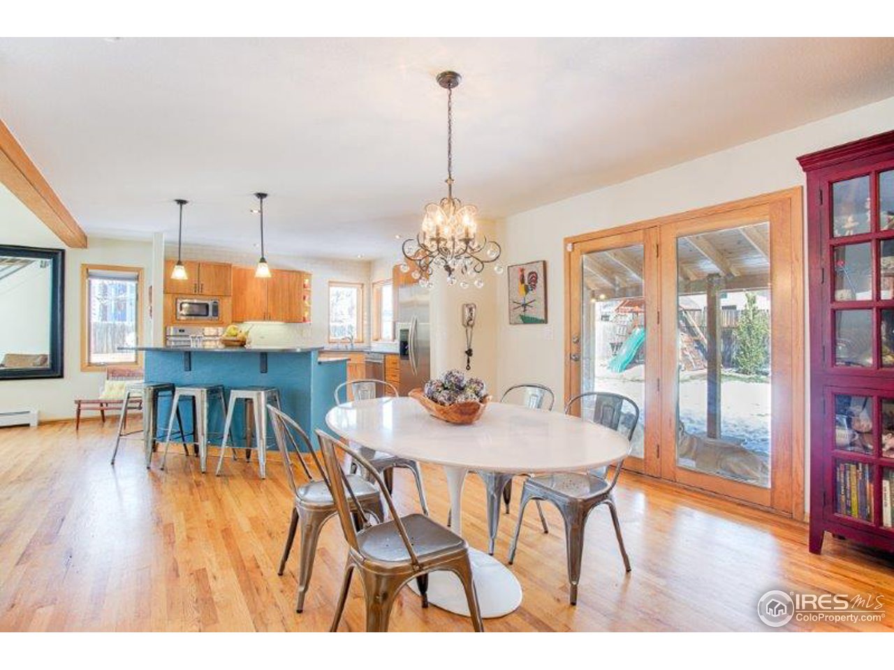 1301 Riverside Avenue Boulder, CO 80304 - Photo 7 of 25 a view of a dining room with furniture window and wooden floor