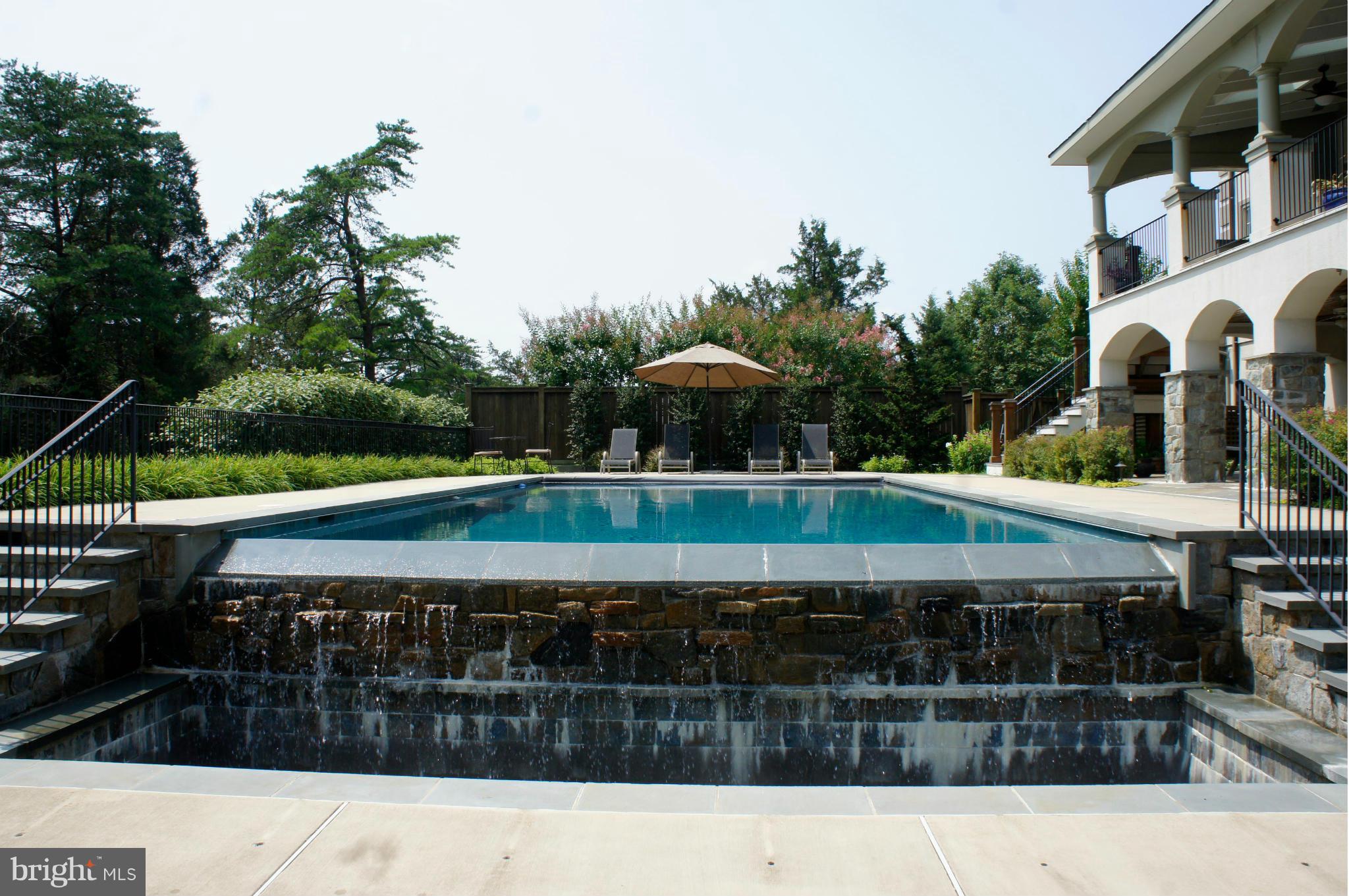 13501 Esworthy Road Darnestown, MD 20874 - Photo 23 of 30 Pool with Waterfall