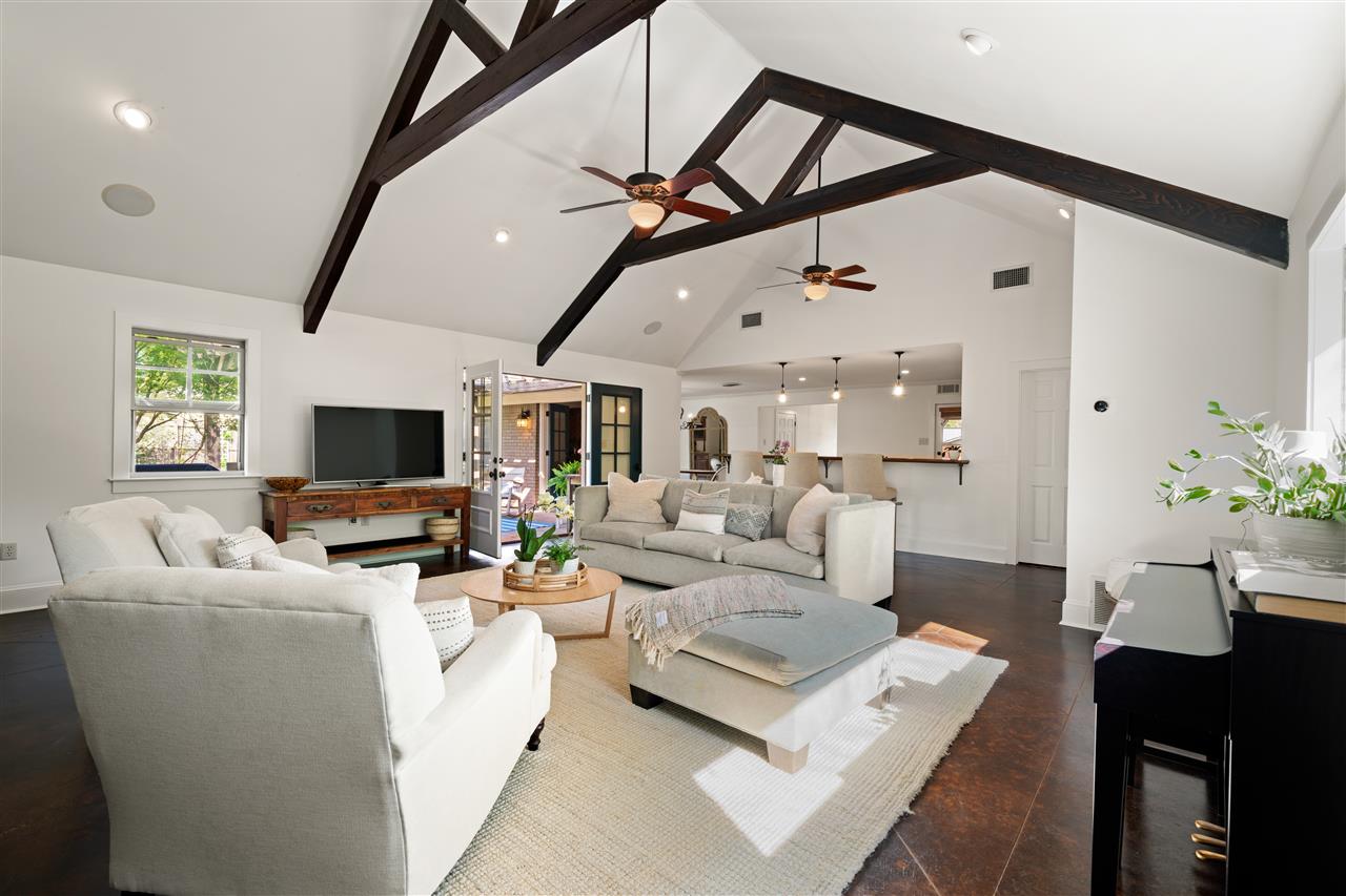 Wow! Upon entering, you see the view of the astounding Hearth/Family Room with soaring 14’ beamed ceiling and floor-to-ceiling stacked stone   fireplace. Fabulous Granite Kitchen w/many outstanding features, updated baths, and breathtaking   rear grounds!