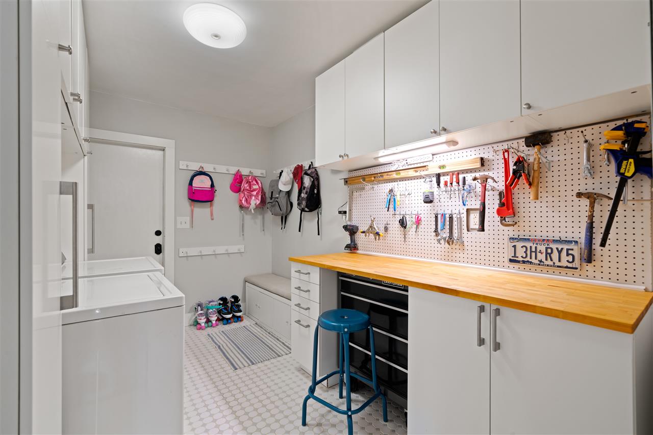 4165 Barfield Road Memphis, TN 38117 - Photo 10 of 24 FABULOUS Laundry Room with Amazing Workshop Area and Custom Cubbies on Both Walls - this is a GREAT Space!
