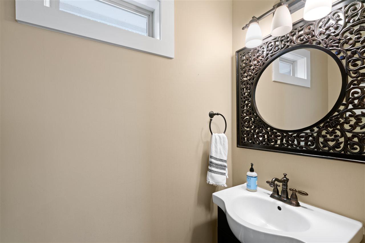 4165 Barfield Road Memphis, TN 38117 - Photo 11 of 24 Updated Half Bath with Furniture Style Vanity and Custom Mirror