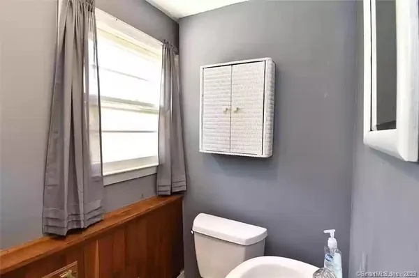 a workspace with furniture and window