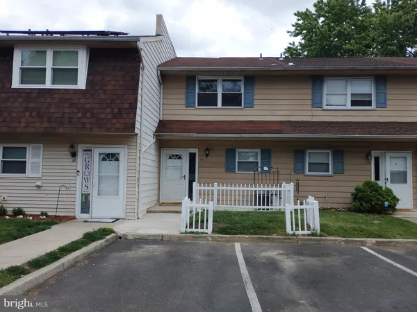 a front view of a house with a garage